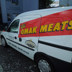 Omak Meats van signs